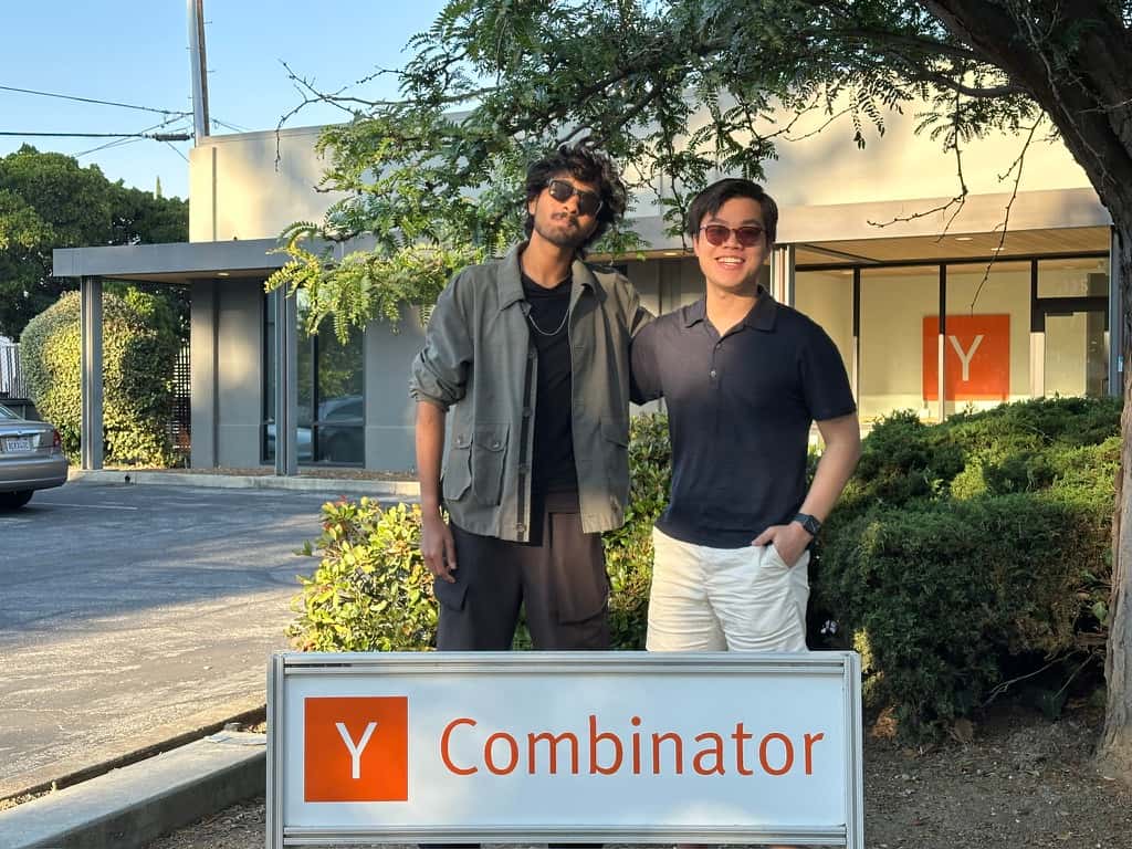Mark Rachapoom and Kumar Abhirup outside Y Combinator